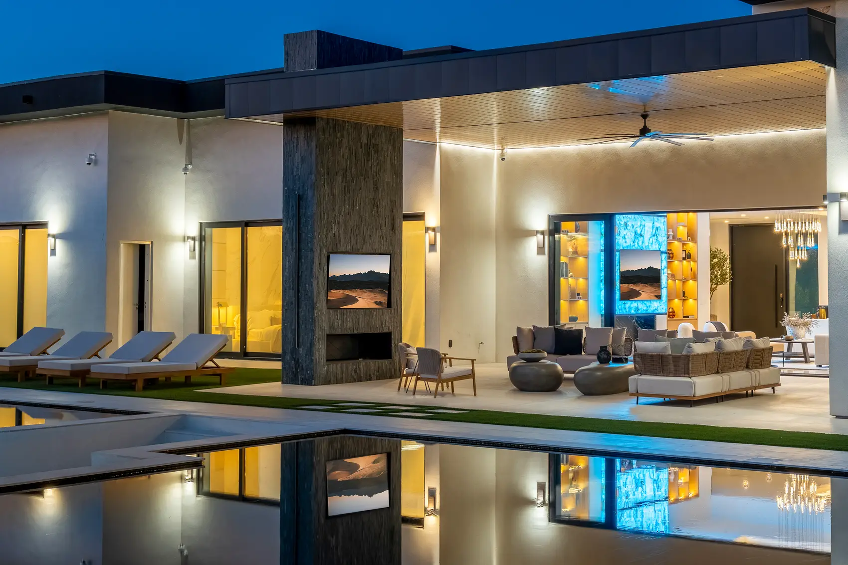 Elysium, the flagship Modern Masterpieces estate in Scottsdale: twilight pool, fire features, and indoor-outdoor living