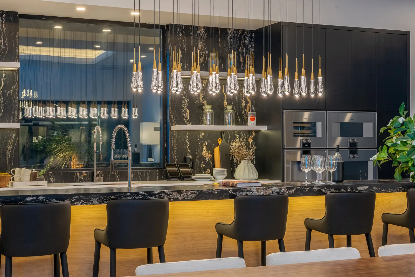 Elysium interior: a dark marble chef's kitchen and bar, Scottsdale, Arizona